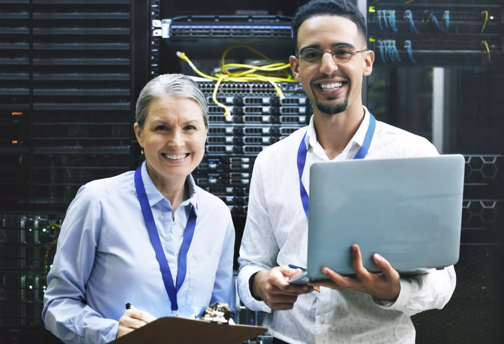 Cheerful Man and Woman Working in Server Room